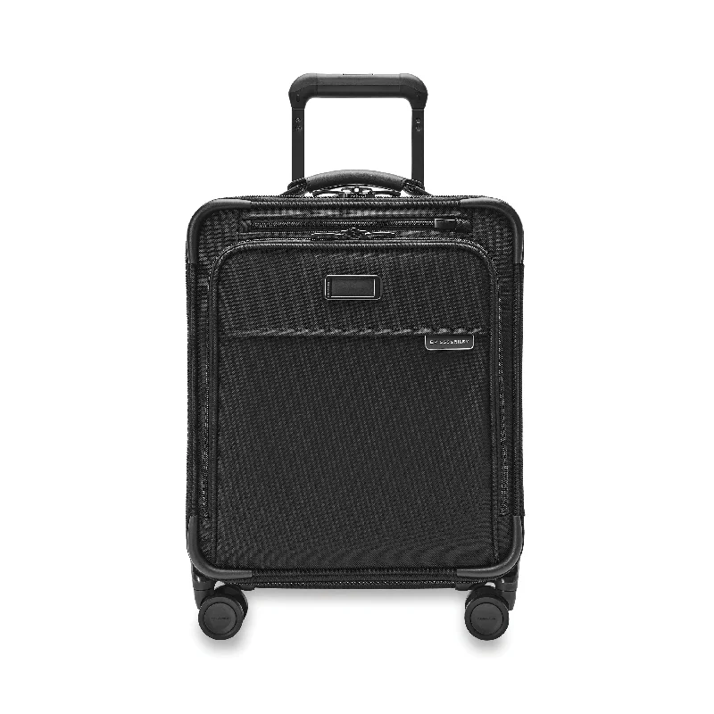 Waterproof luggage covers for protection against rain on outdoor tripsBaseline COMPACT CARRY-ON SPINNER