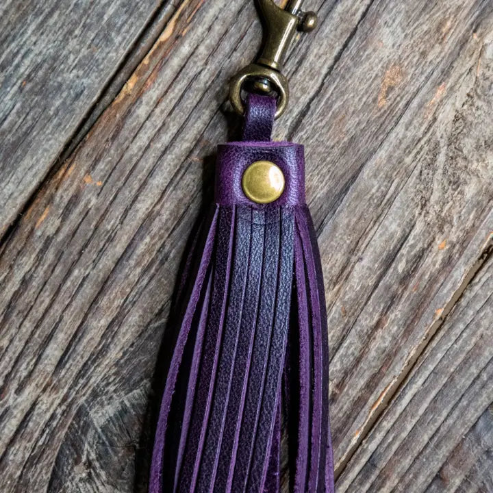 Waterproof luggage covers for protection against rain on outdoor tripsIn Blue Handmade Leather Tassel | Leather Key Chain | Leather Fob- $23