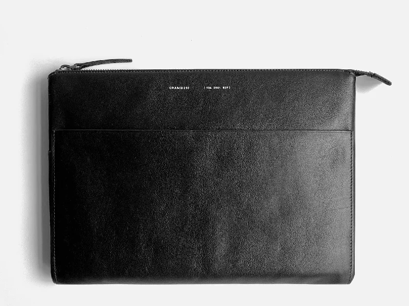 Garment - protected travel bag with hanging system for suits and dressesGrams(28) 106 Leather Folio