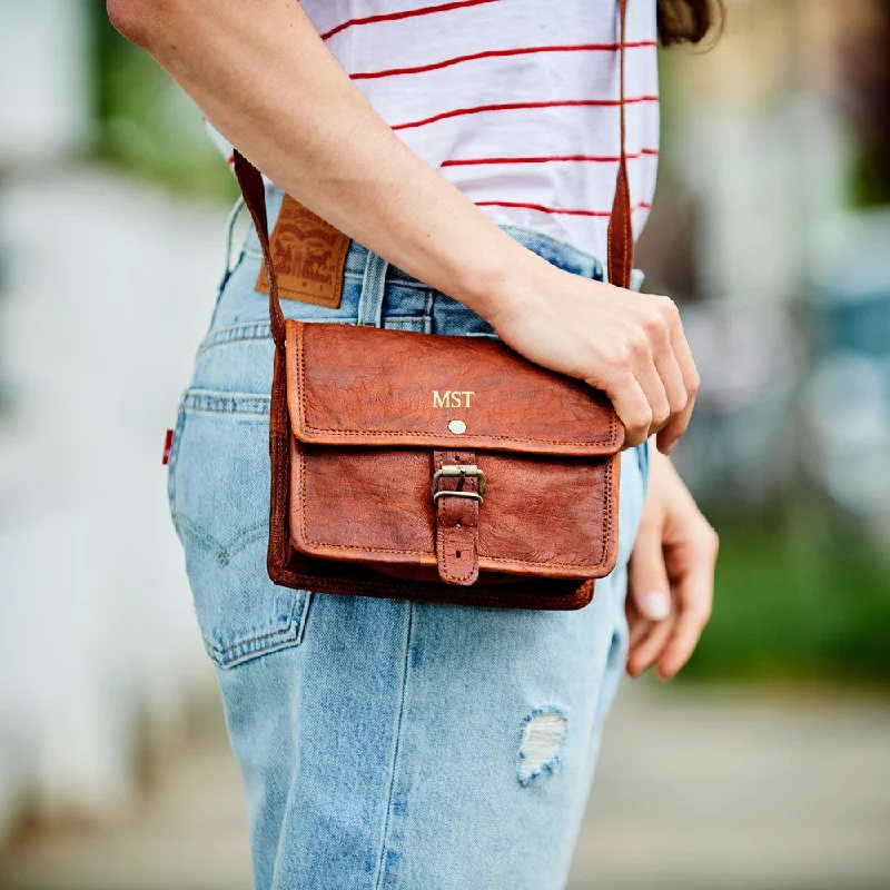 Convertible travel bag that can be used as a backpack or toteLeather Mini Mini Bag