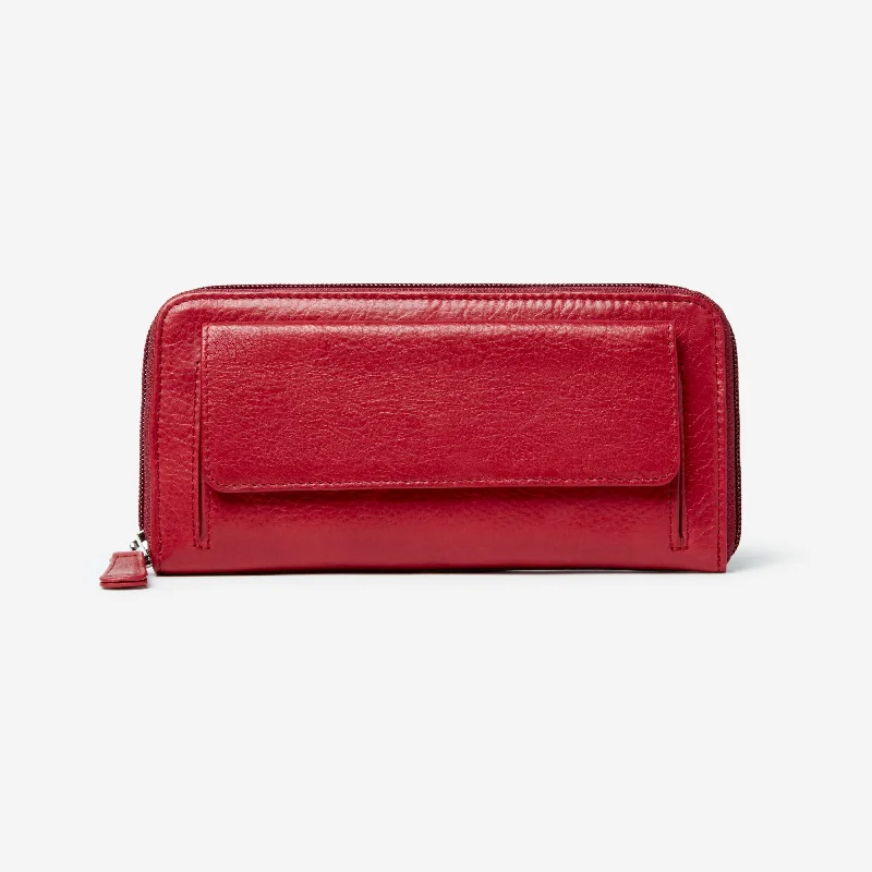 Convertible wallet that can be used as a clutch for dual functionalityOsgoode Marley Leather Women's Zip Around Wallet