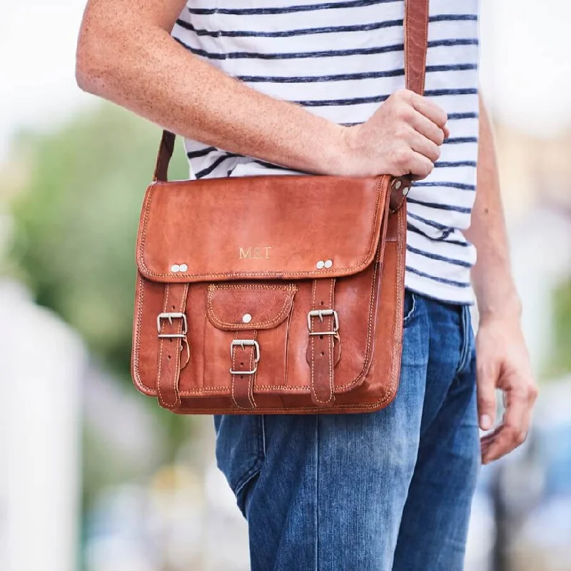 Vintage leather travel bag with brass accents for a classic and sophisticated lookMen's Small Leather Satchel with Front Pocket