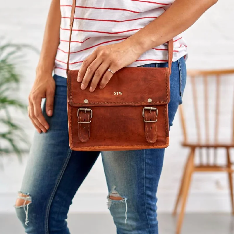 Vintage leather travel bag with brass accents for a classic and sophisticated lookMini Leather Satchel Bag